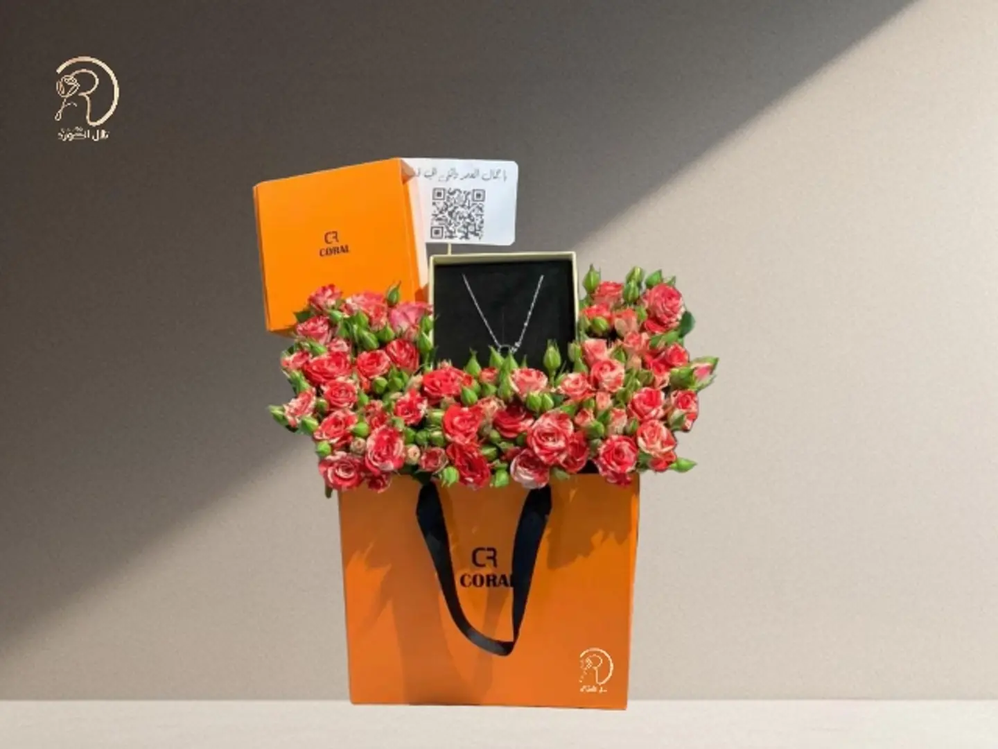 Arrangement Of Radiance Of Roses And A Necklace From Coral