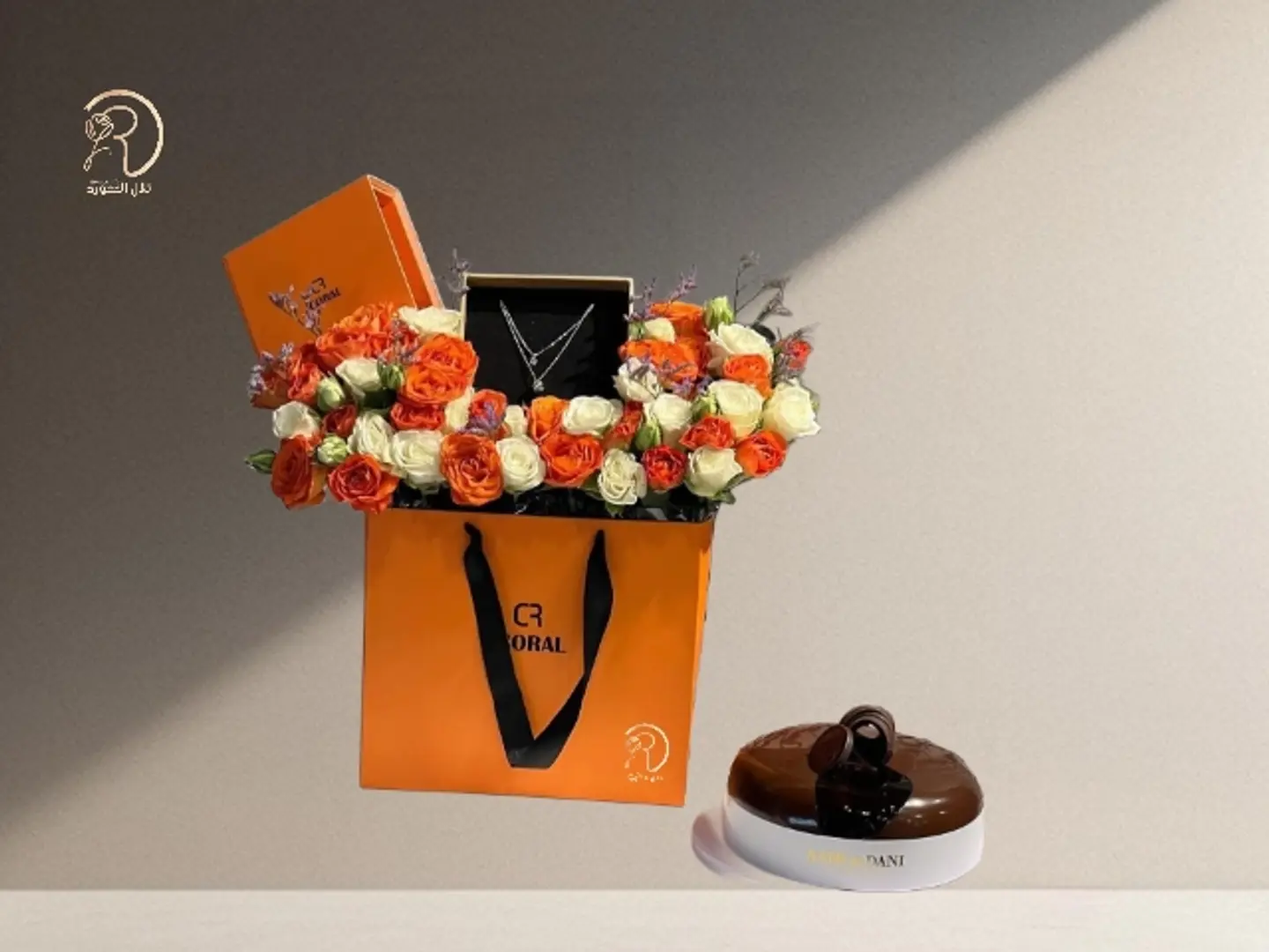 An Arrangement That Combines The Luxury Of Roses Cake And Chains