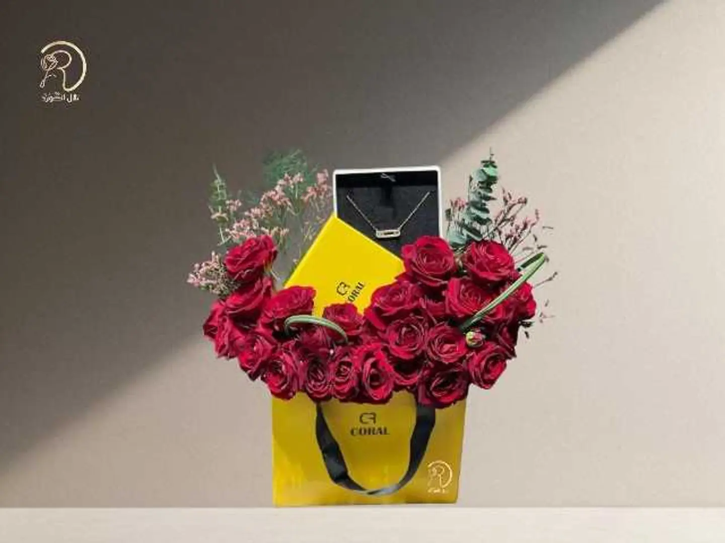 Red Rose Arrangement With A Necklace From Brand Coral