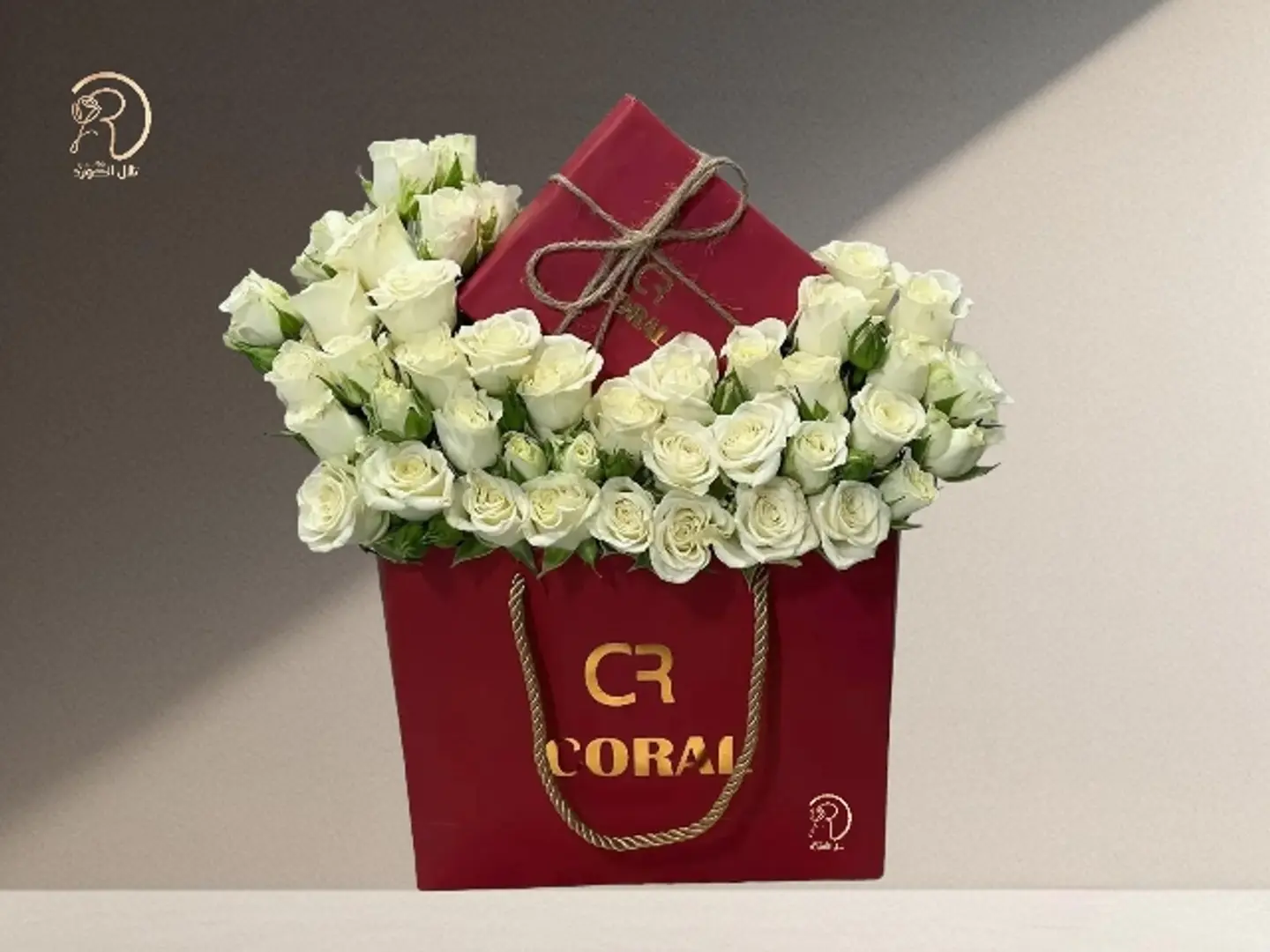 An Elegant Natural Rose Arrangement With A Sweet Touch From Coral Gift