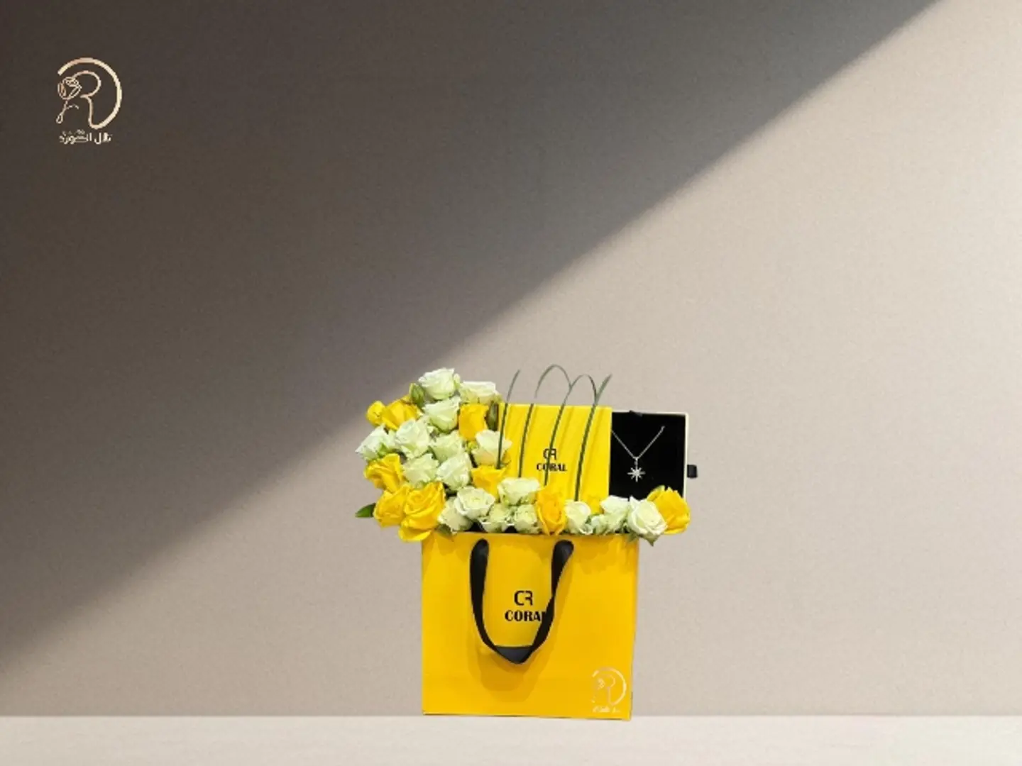 Luxurious Austrian Arrangement Of Roses Box With Charming Coral Pendant Details