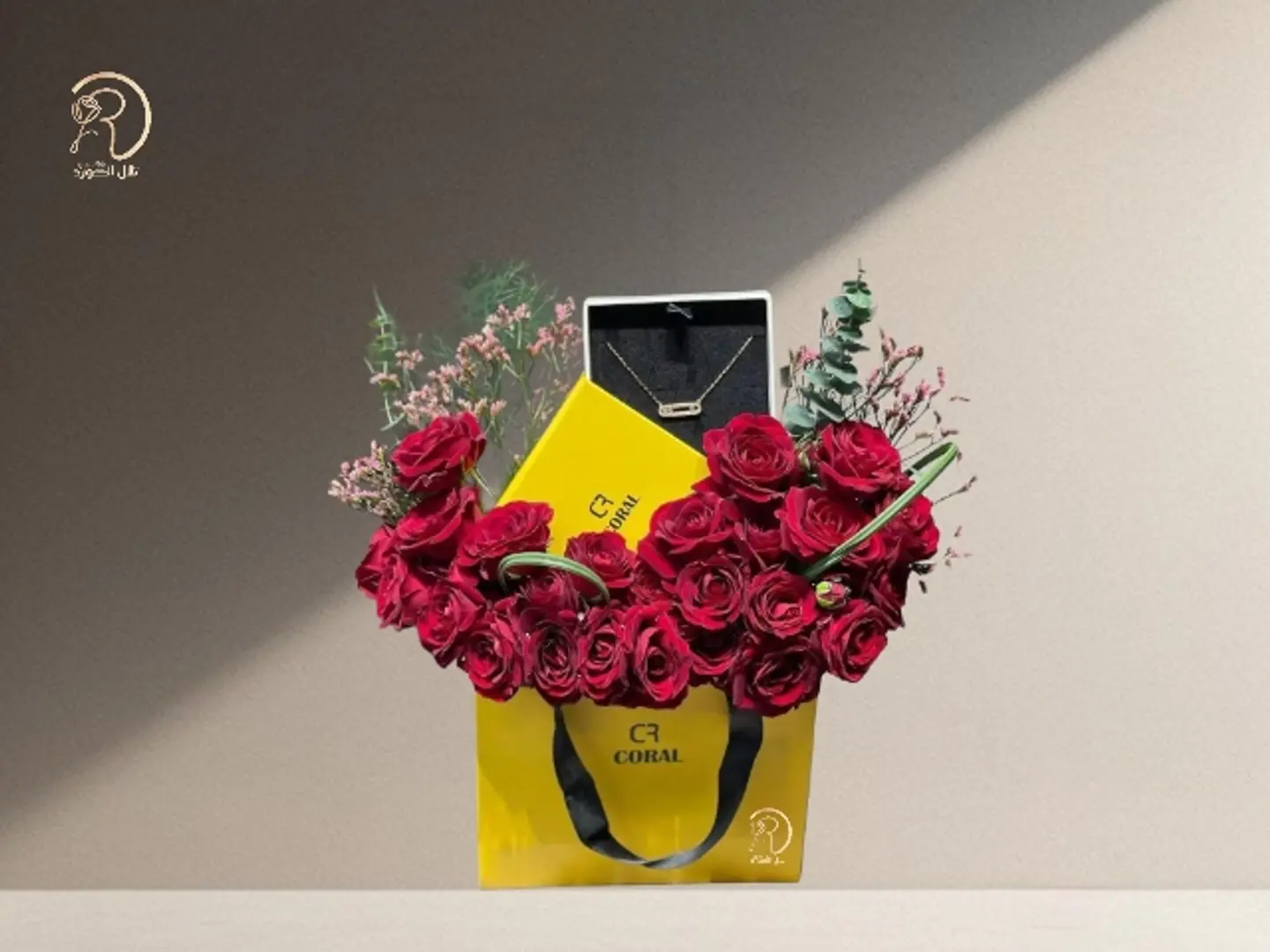 Red Rose Arrangement With A Necklace From Brand Coral