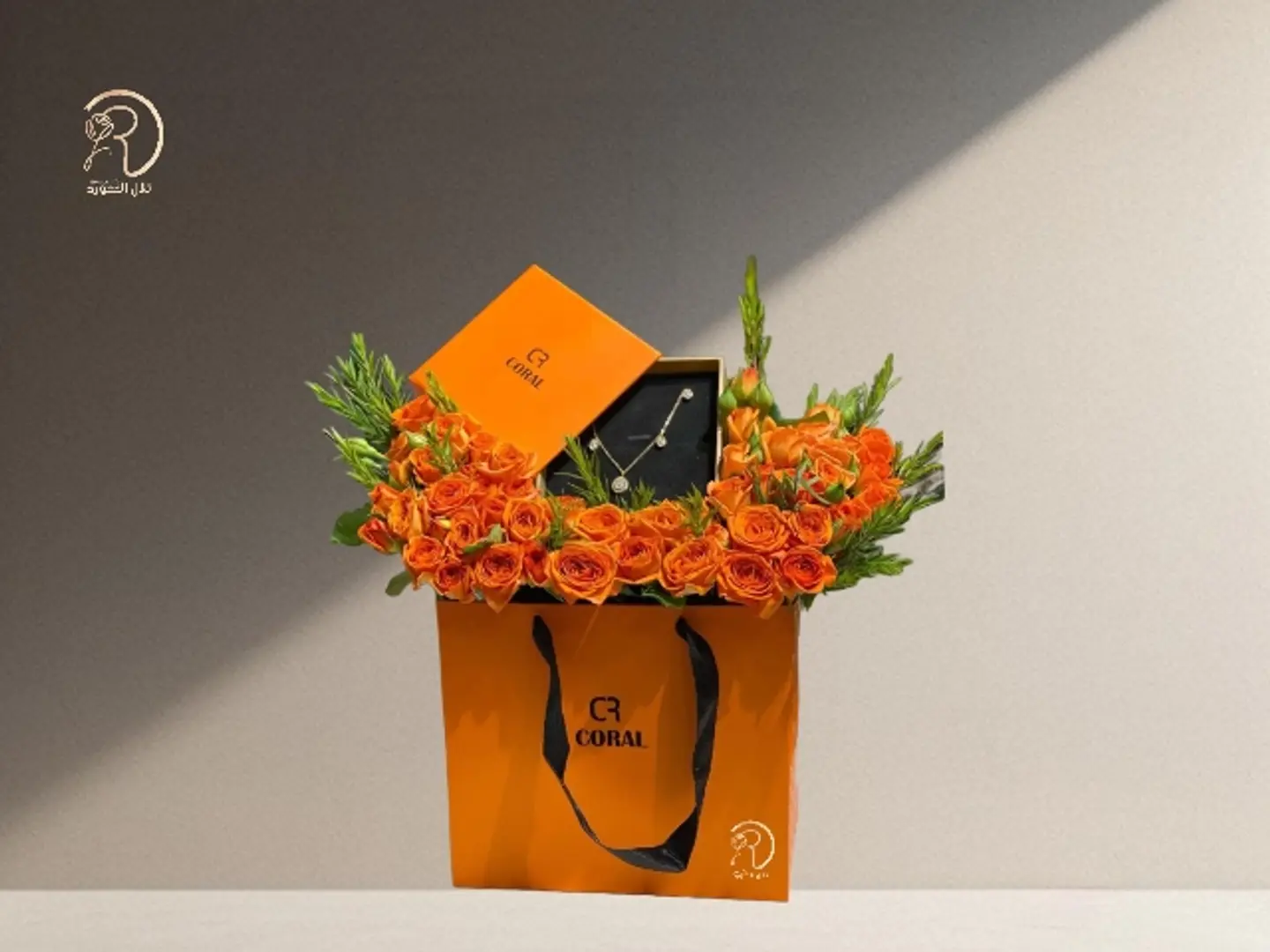 Ishraqa Floral Arrangement With Brand Coral