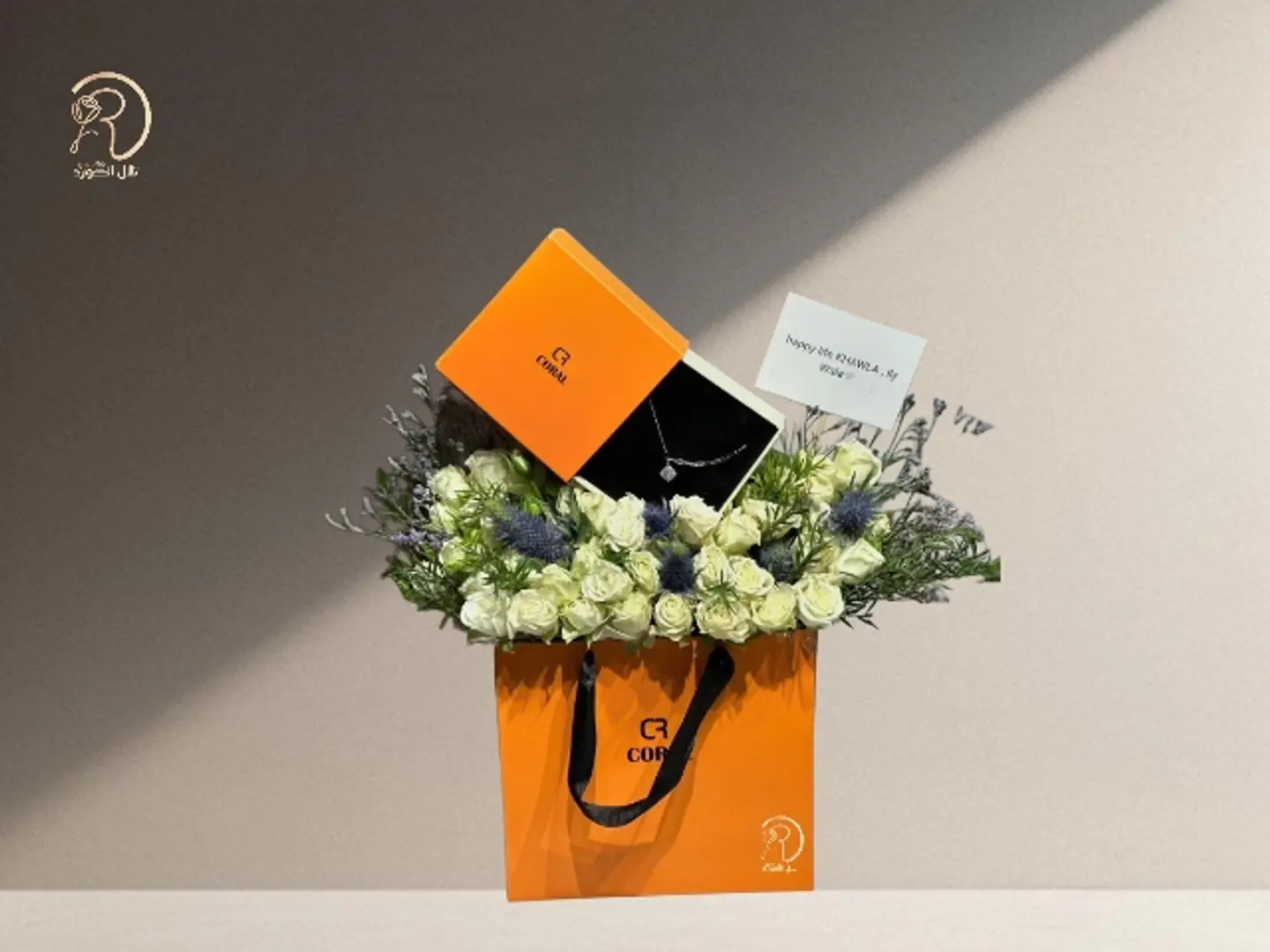 Luxurious Rose Arrangement With Coral Necklace