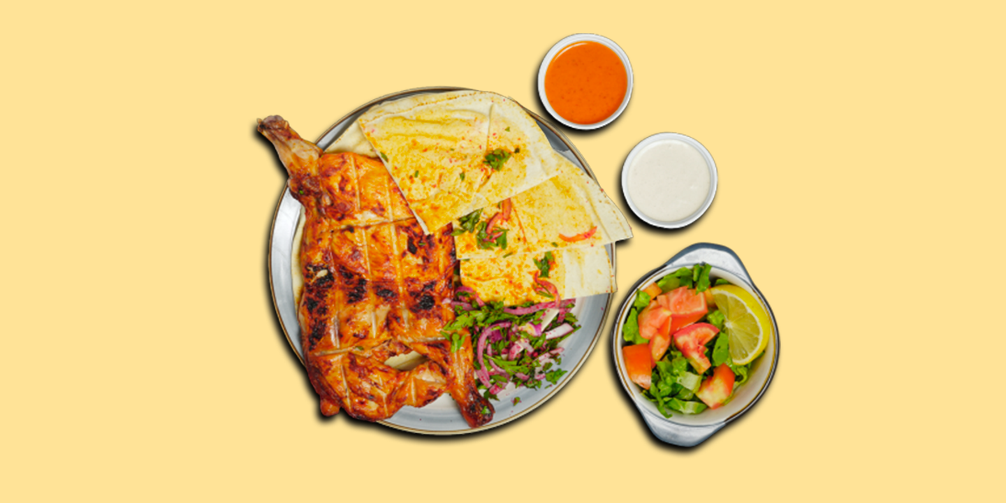 نصف حبة دجاج على الفحم