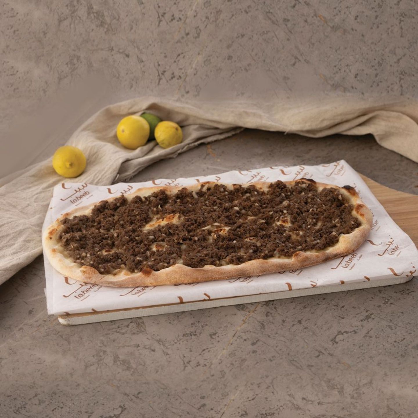 لحم بالعجين مع دبس الرمان