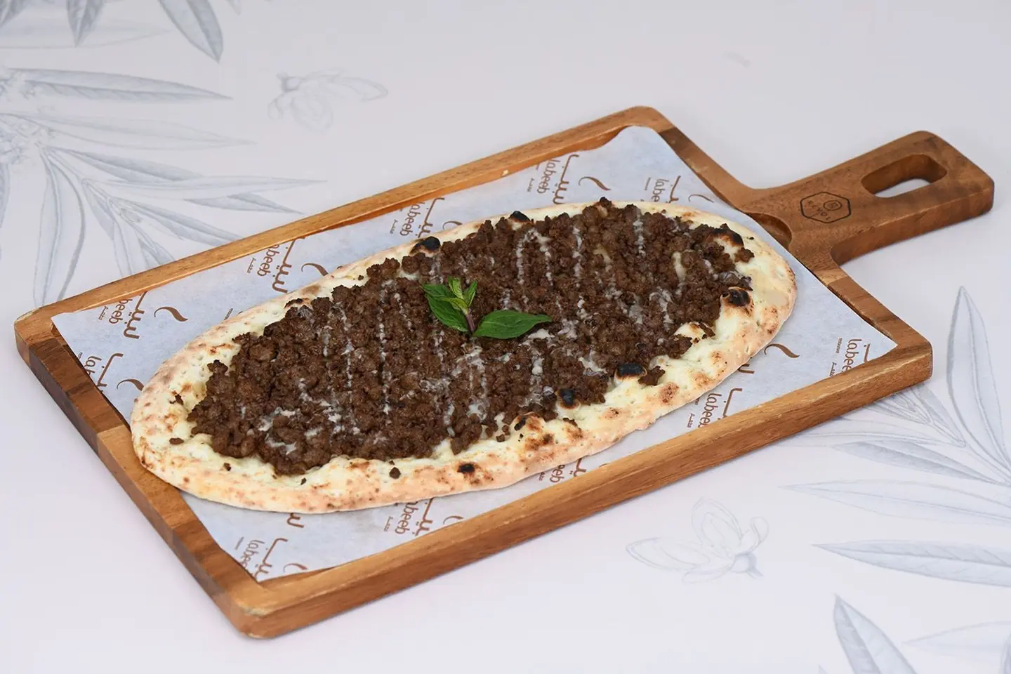 لحم بعجين مع دبس الرمان