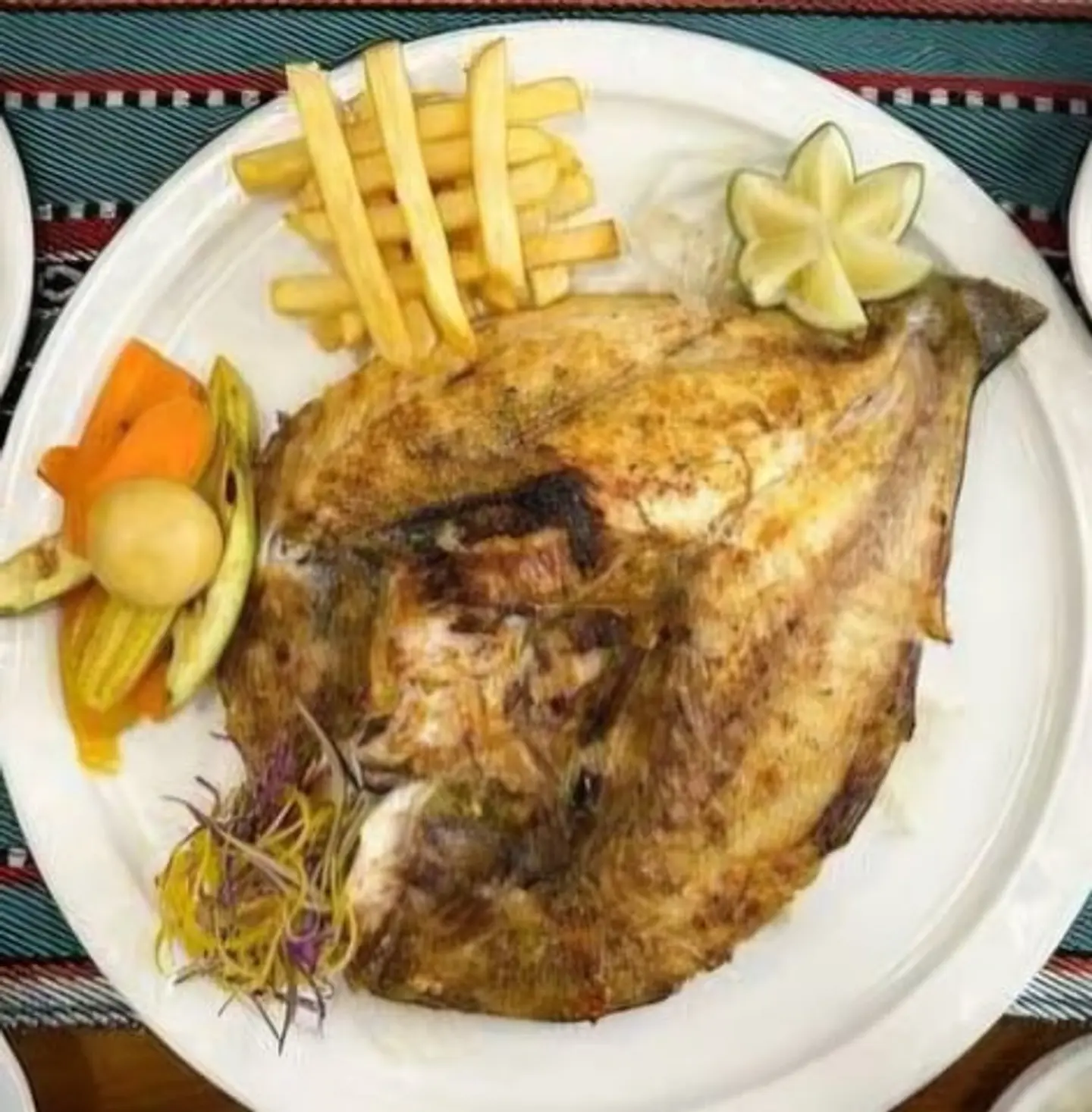 سمك دنيس مشوي عالفحم