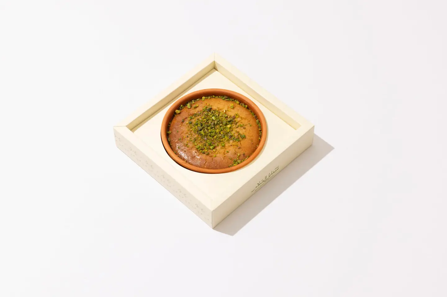 Basbousa With Cream Served In A Clay Pot