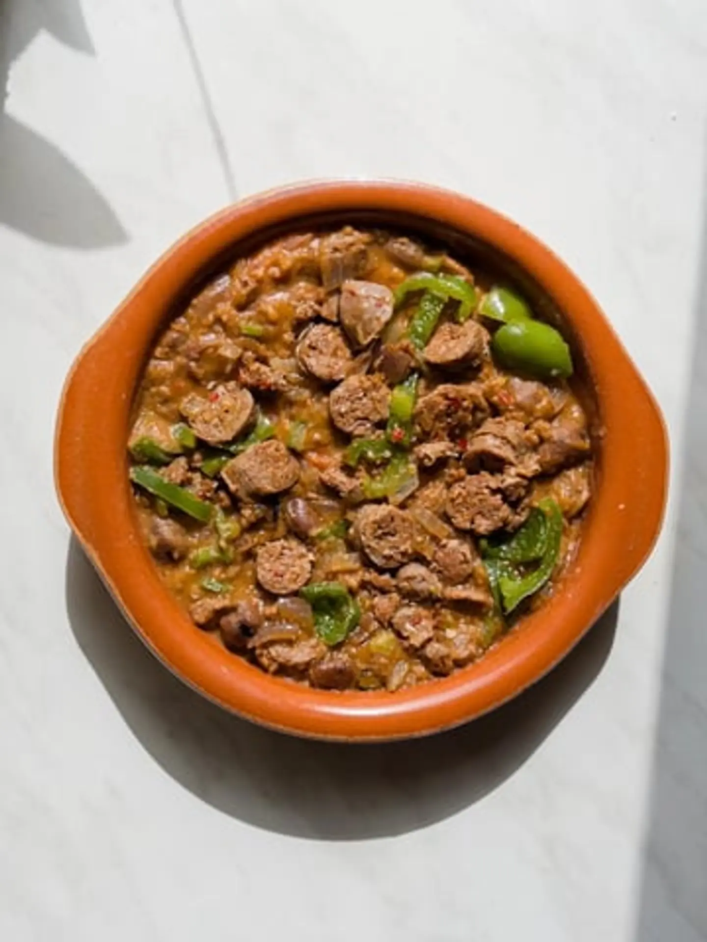 طاجن فول بالسجق