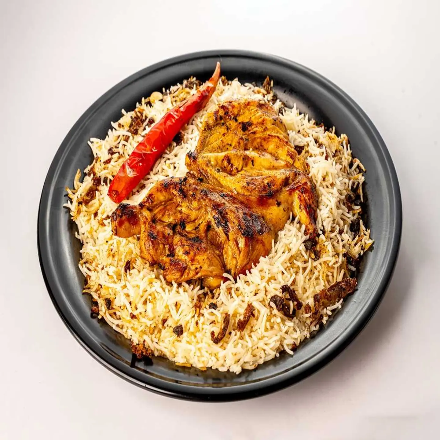 نصف دجاج مظبي مع الارز