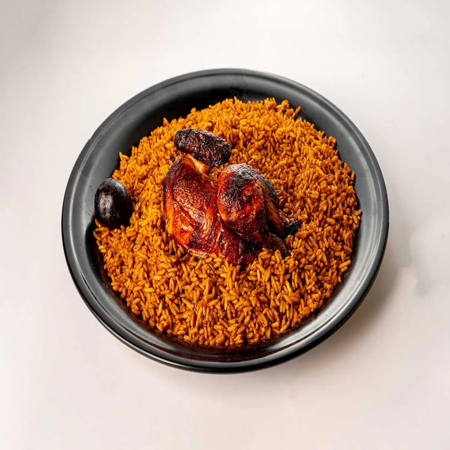 Half A Grilled Chicken With Rice