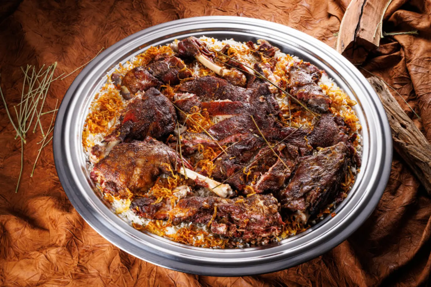 نصف ذبيحة تيس حنيذ مدخن مع الرز