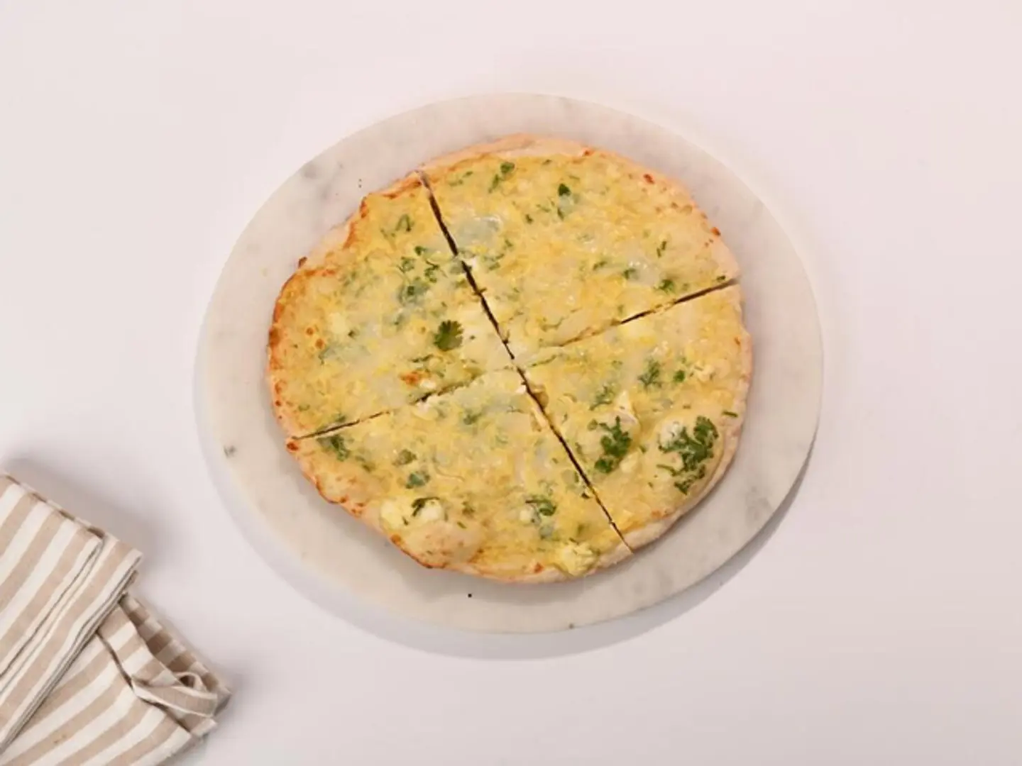 Manakeesh With Eggs & Goat Cheese & Herbs