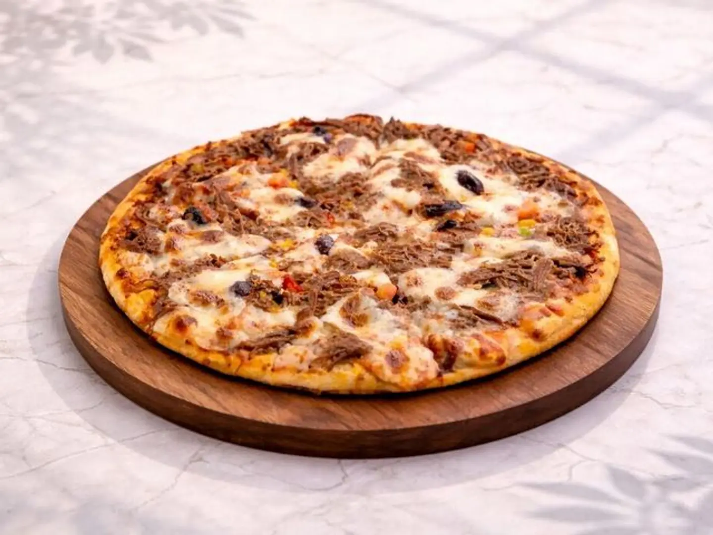 بيتزا باللحم ١٠٠ جم