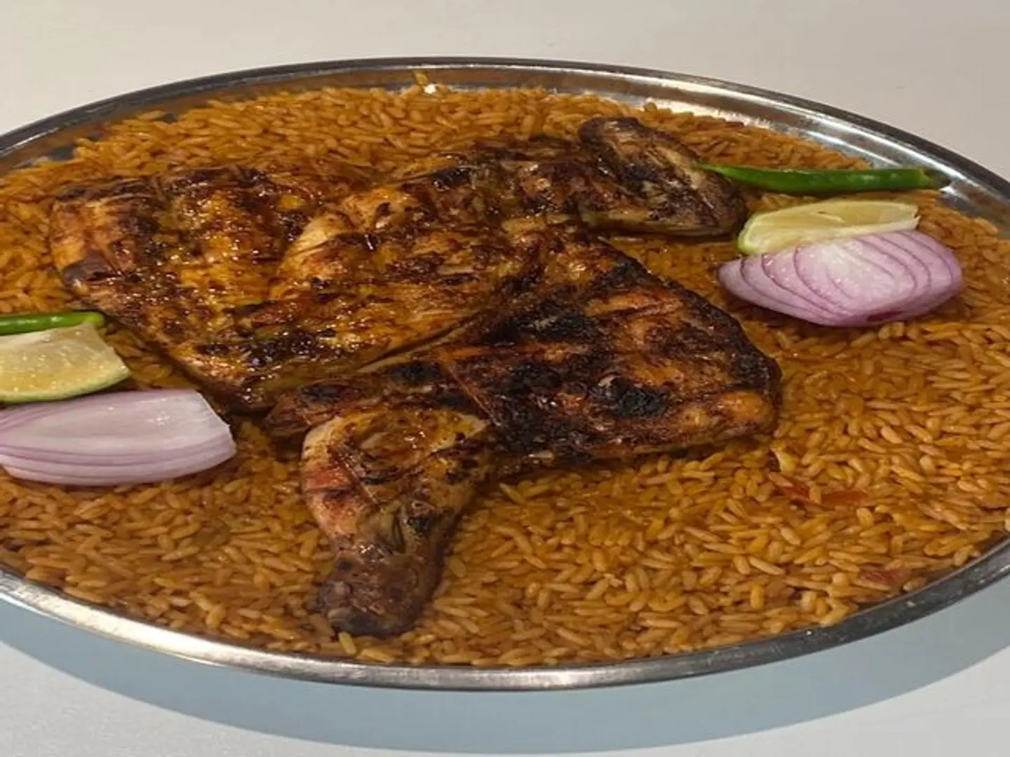 Half Old Chicken On Charcoal And Rice
