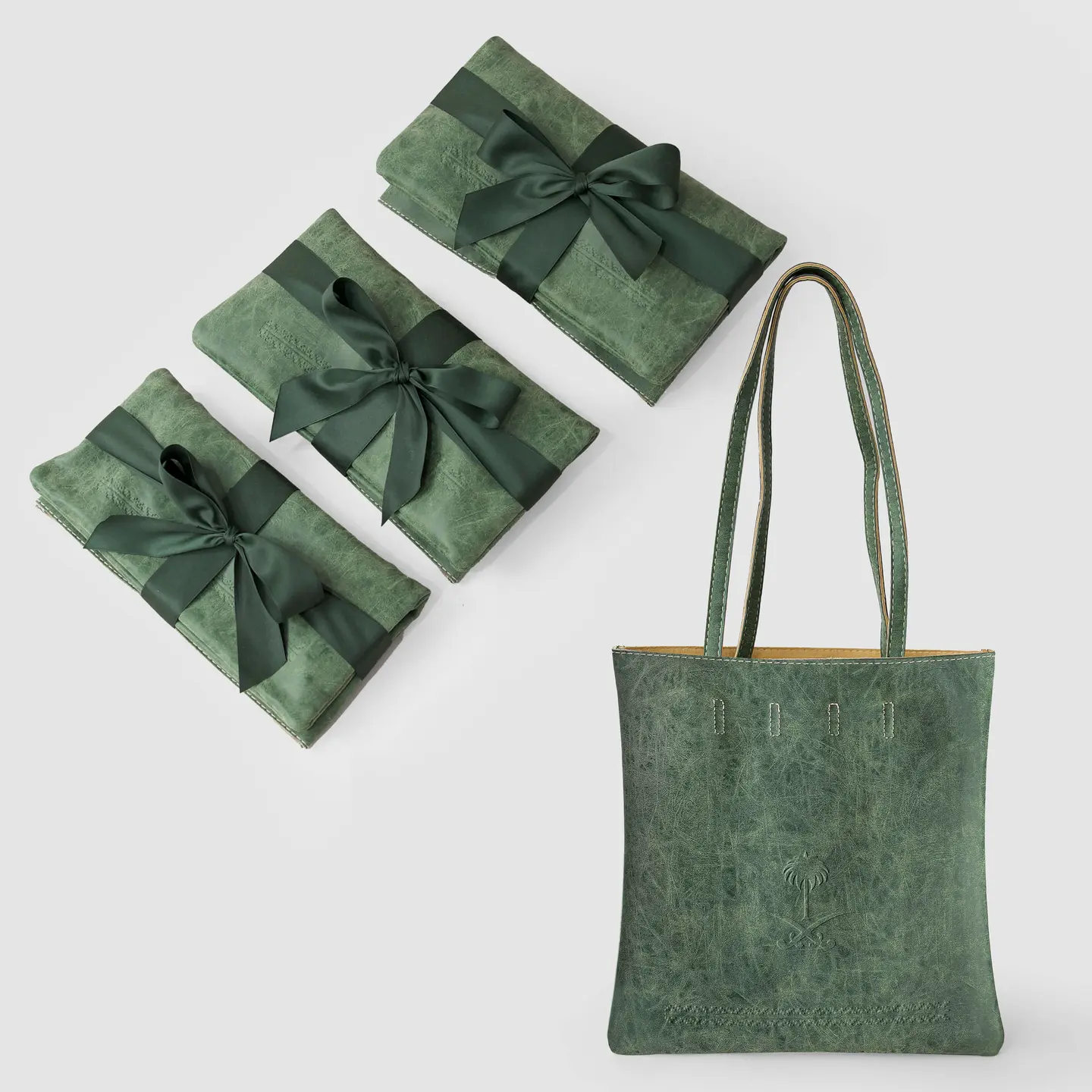 Gift Bags With A Twosword And Palm Tree Logo