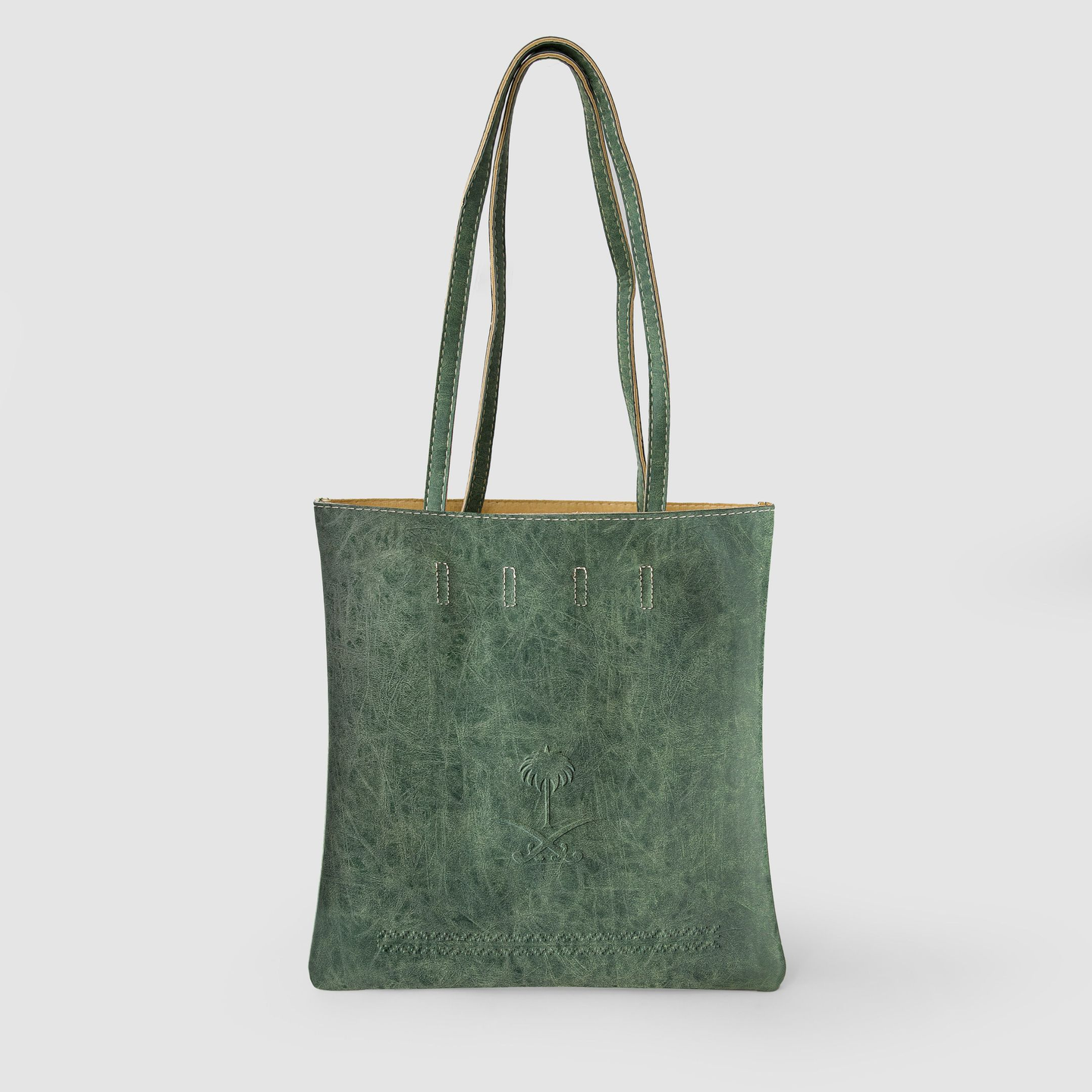 A Bag With A Green Swords And Palm Tree Logo