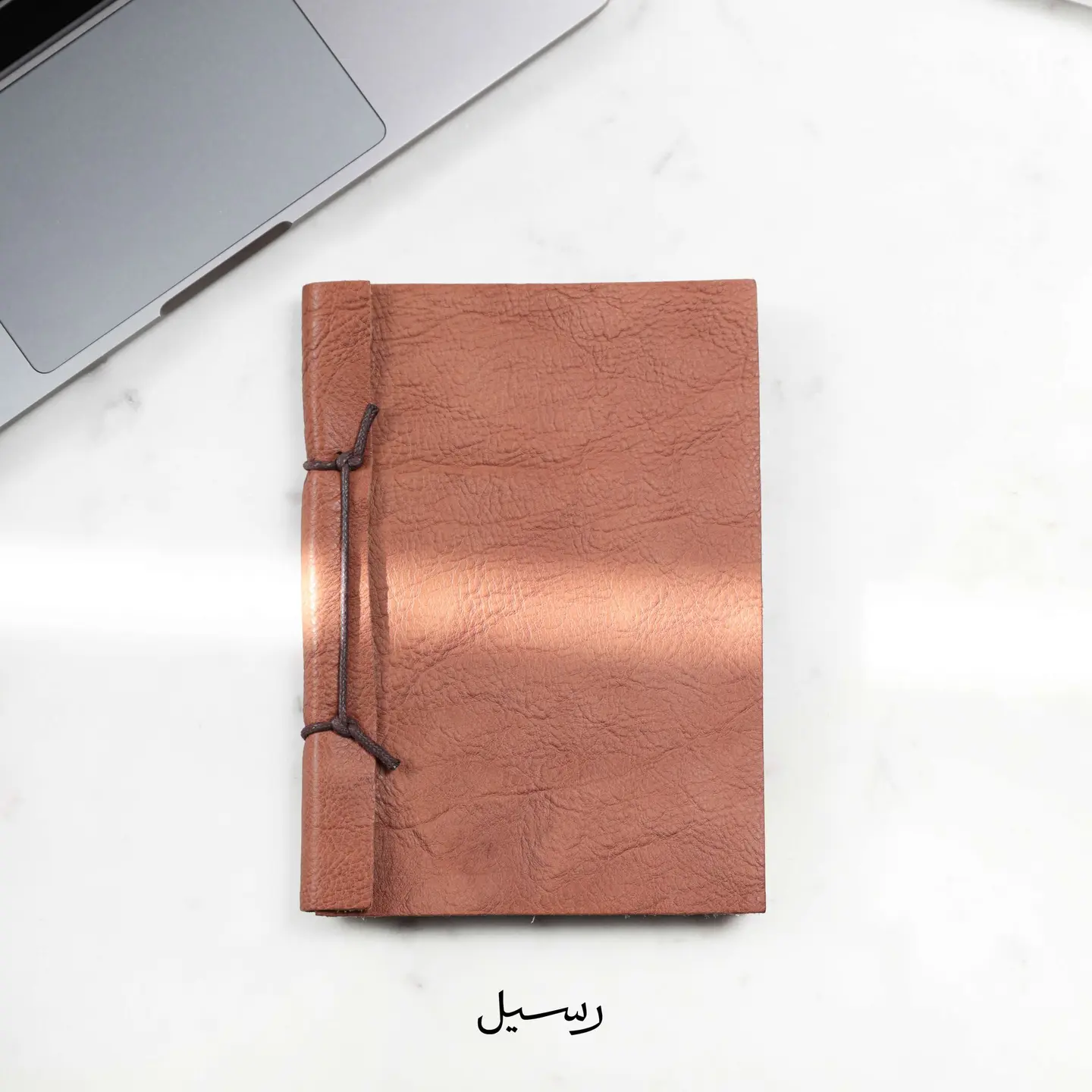 دفتر جلدي منقوش بني