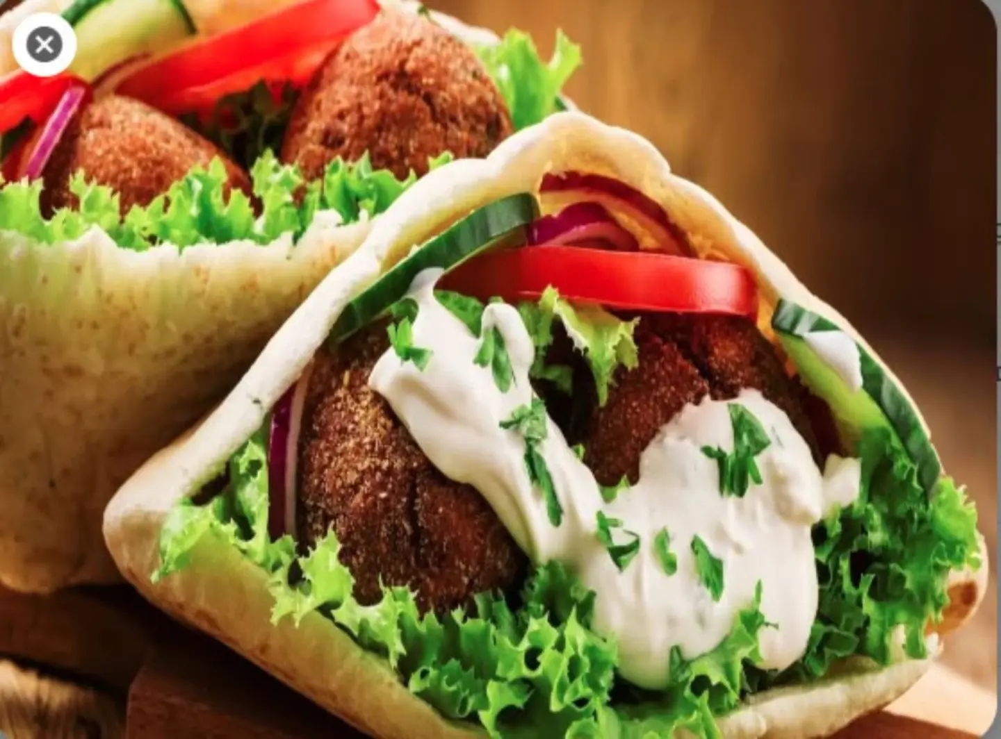 Falafel Sandwich With Zahrah And Eggplant