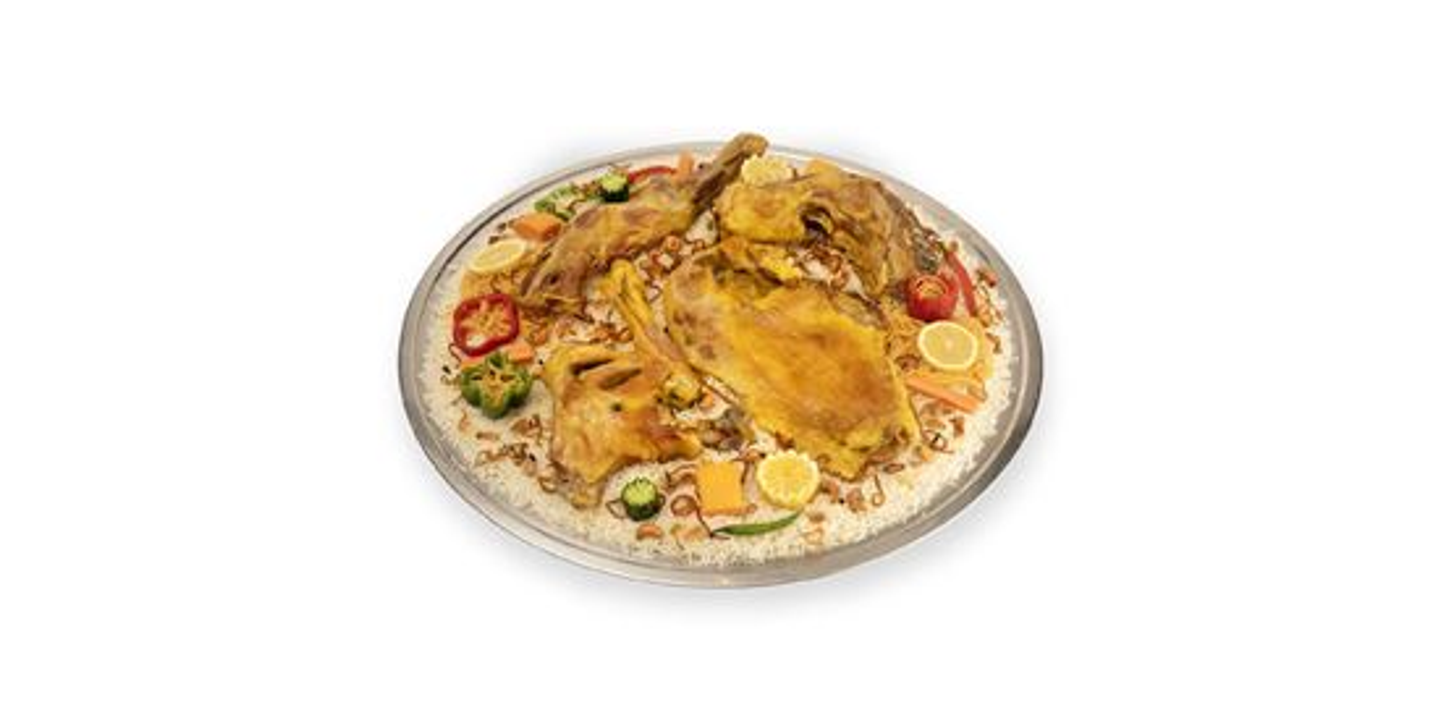 A Half Of A Mandi Goat With Peshawar Rice With Plate