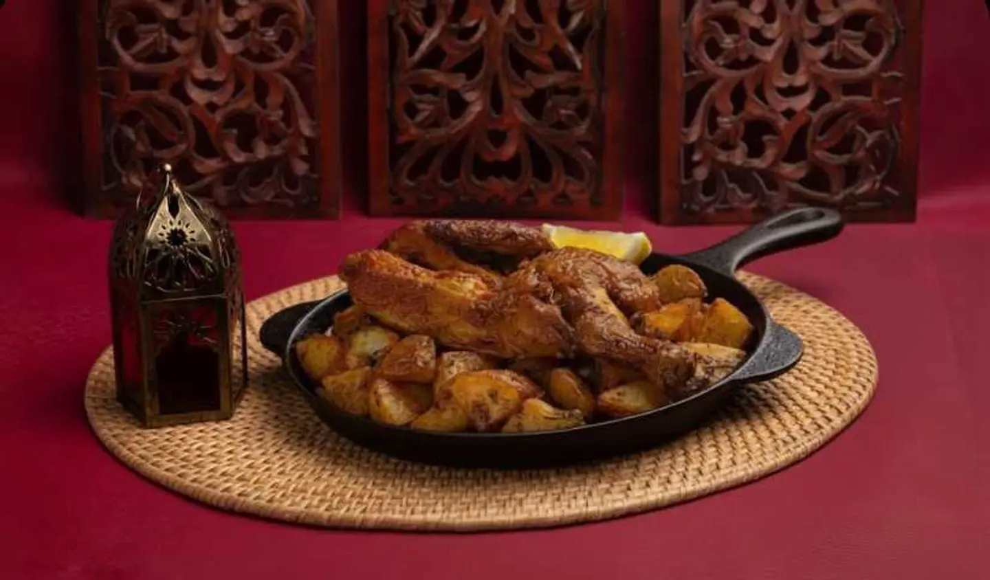 نصف دجاجة مشوية مع بطاطس