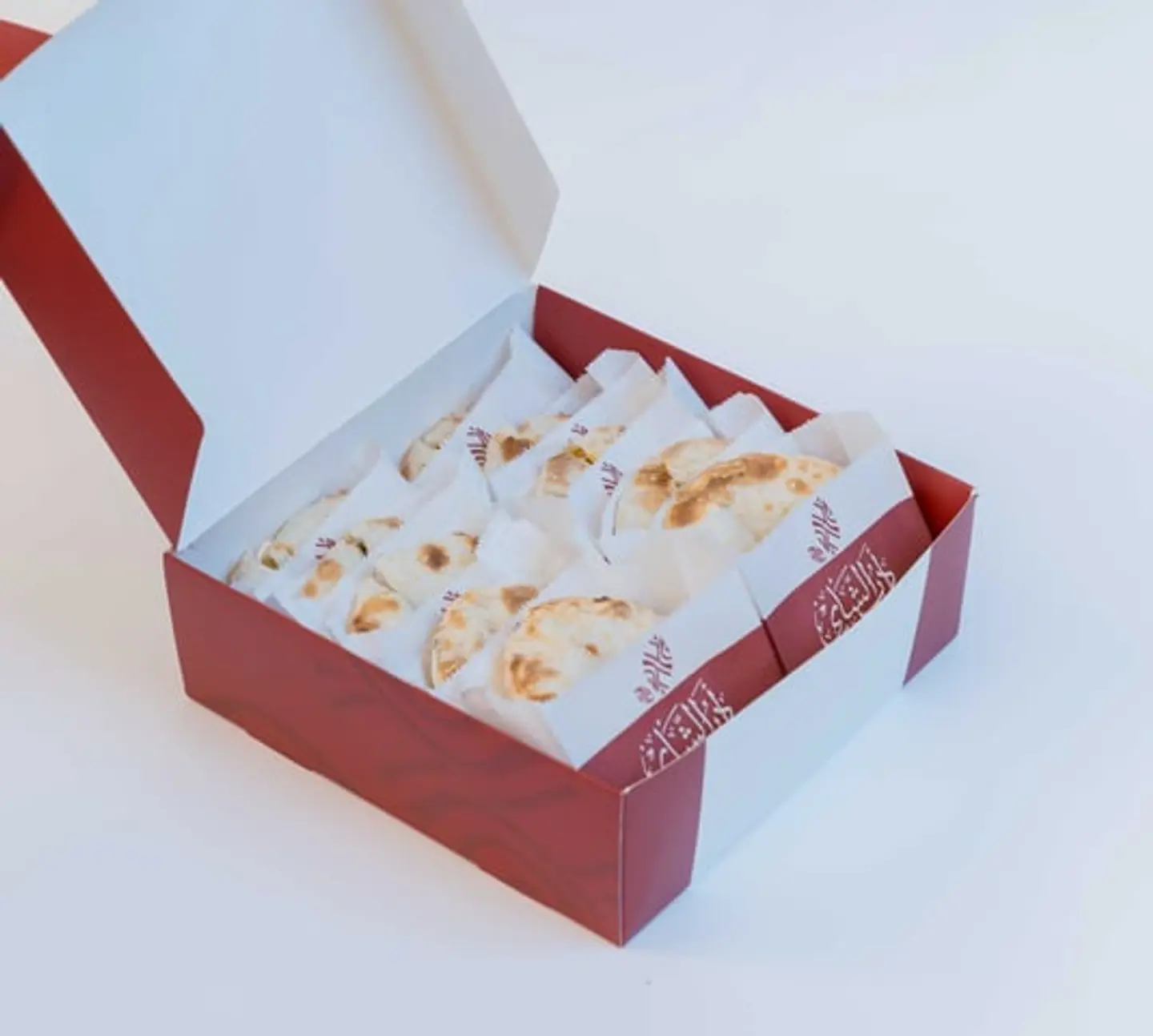 Box Of 10 Assorted Baked Goods.