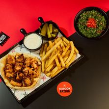 عرض طبق طاووق