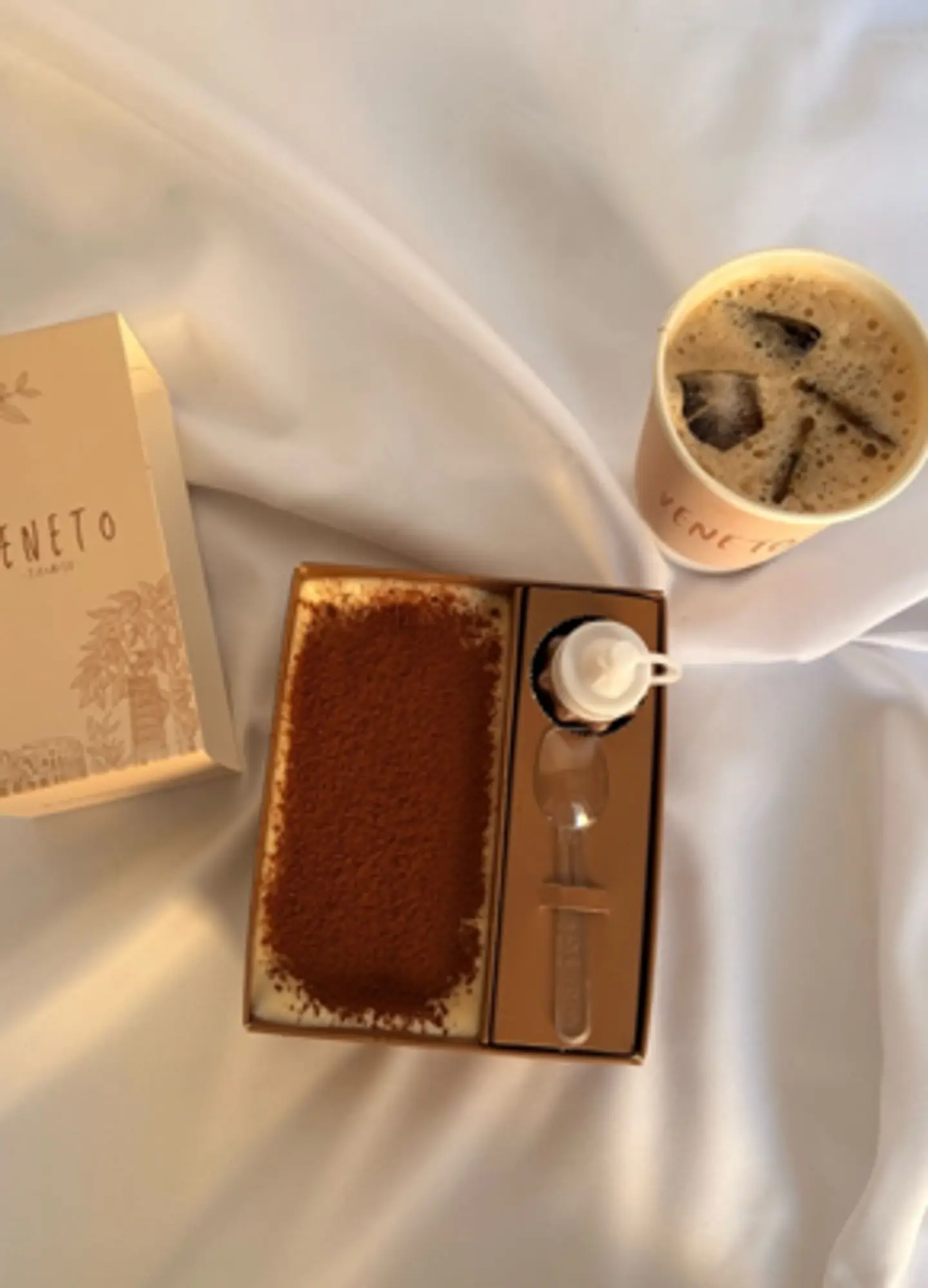 Cold Black Coffee With One Mini Chocolate Tiramisu