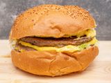 Jumbo Burger With Cheese And Eggs Sandwich