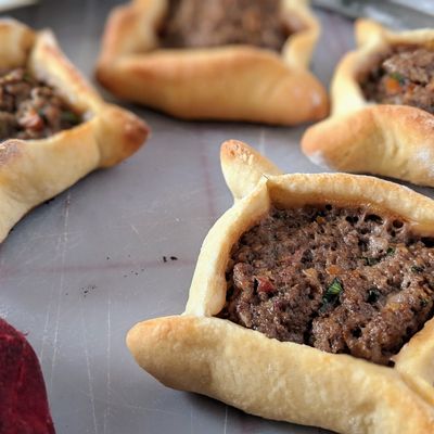 Meat Safiha pomegranate molasses and cheese Manakish