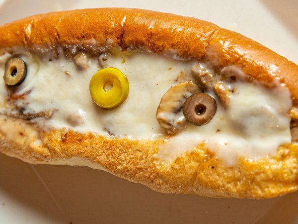 Hot dog pizza and fries