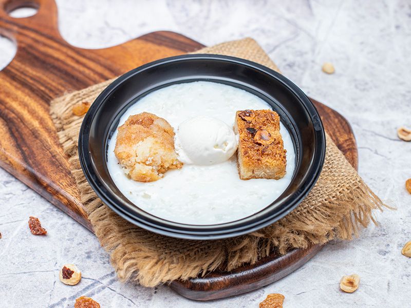Rice Pudding With Basbousa And Konafa And Qeshta