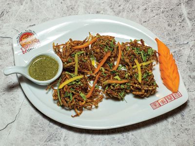 AI04- Onion Bhajia 4 Pieces