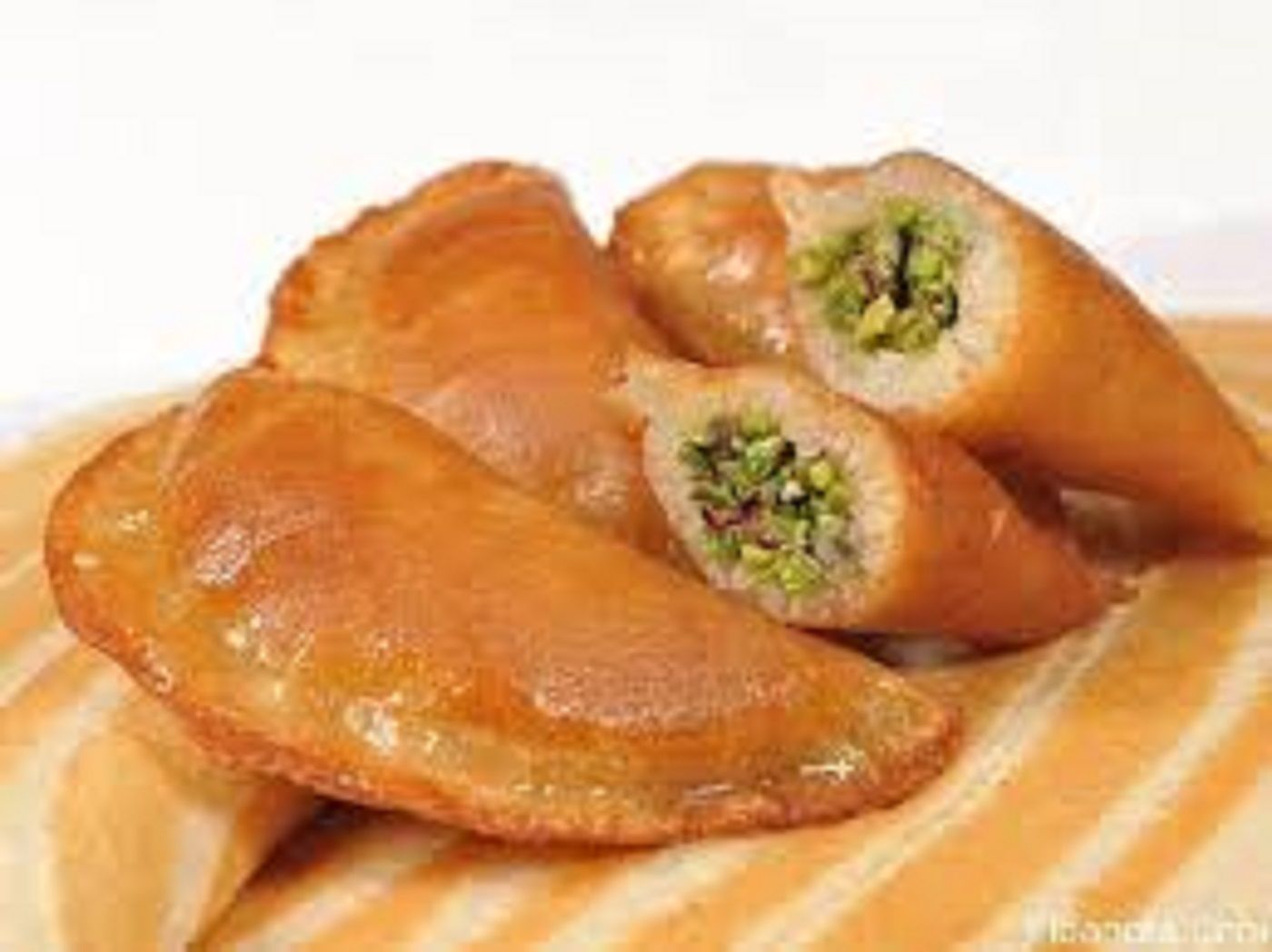 Qatayef With Nuts And Cream And Qeshta With Nutella