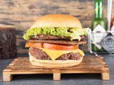 Beef Burger With French Fries, Cheese And Egg Sandwich