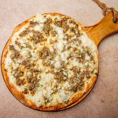 Zaatar with cheese and vegetables Manakish