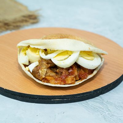 Boiled egg sandwich with moussaka