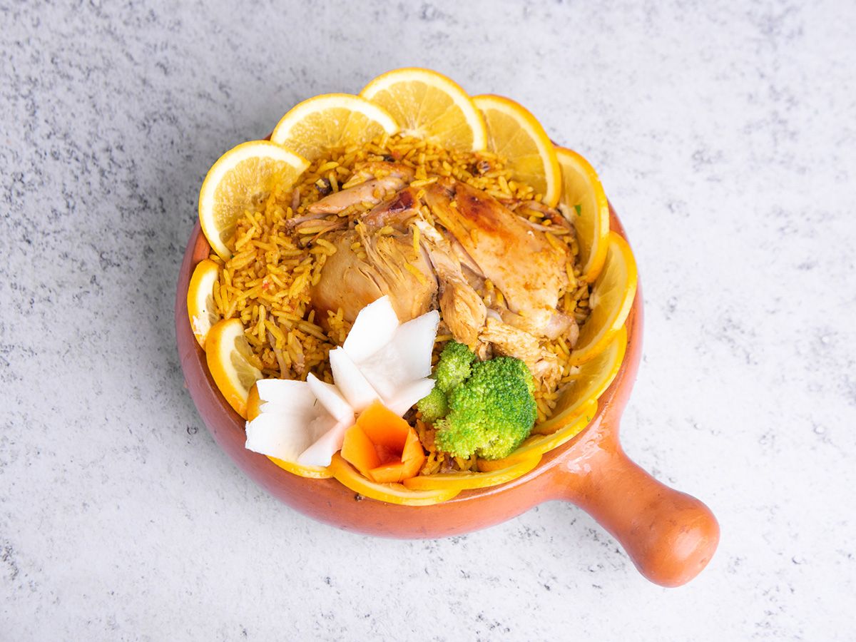 Pressured Cooked Rice With Half Chicken Dish Meal