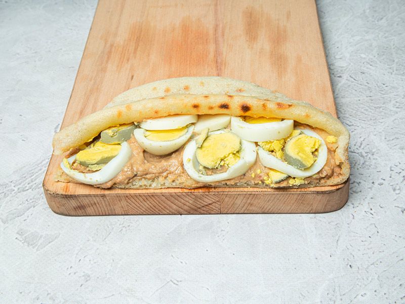Foul sandwich with boiled eggs