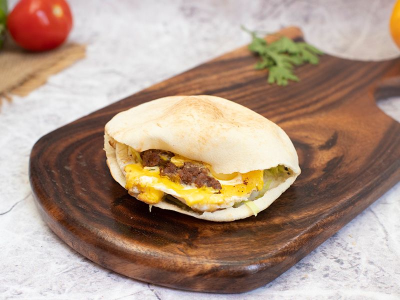 Omelette With Oriental Sausage Sandwich