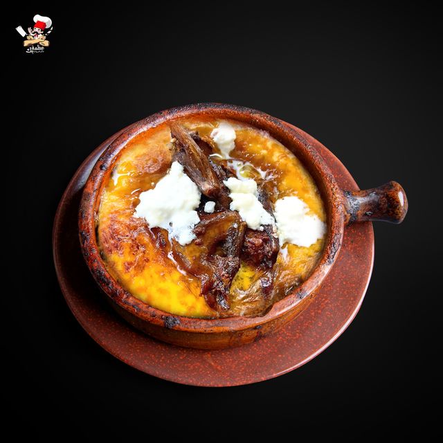 Offer casserole stuffed with pigeons, Qeshta