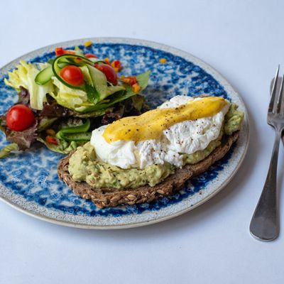 Avocado tartine with poached eggs