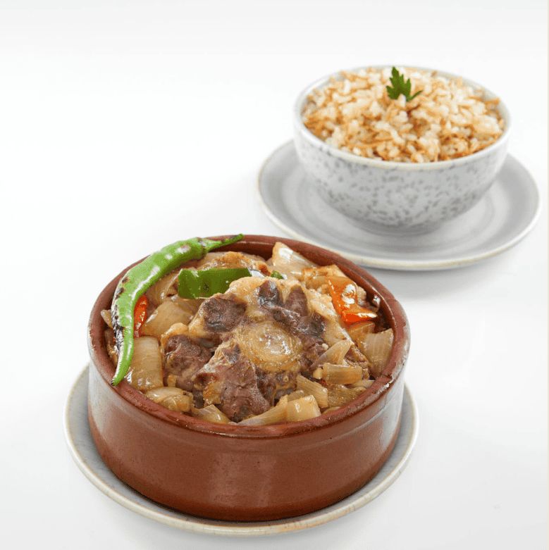 Oxtail Tagine With Onion And Rice