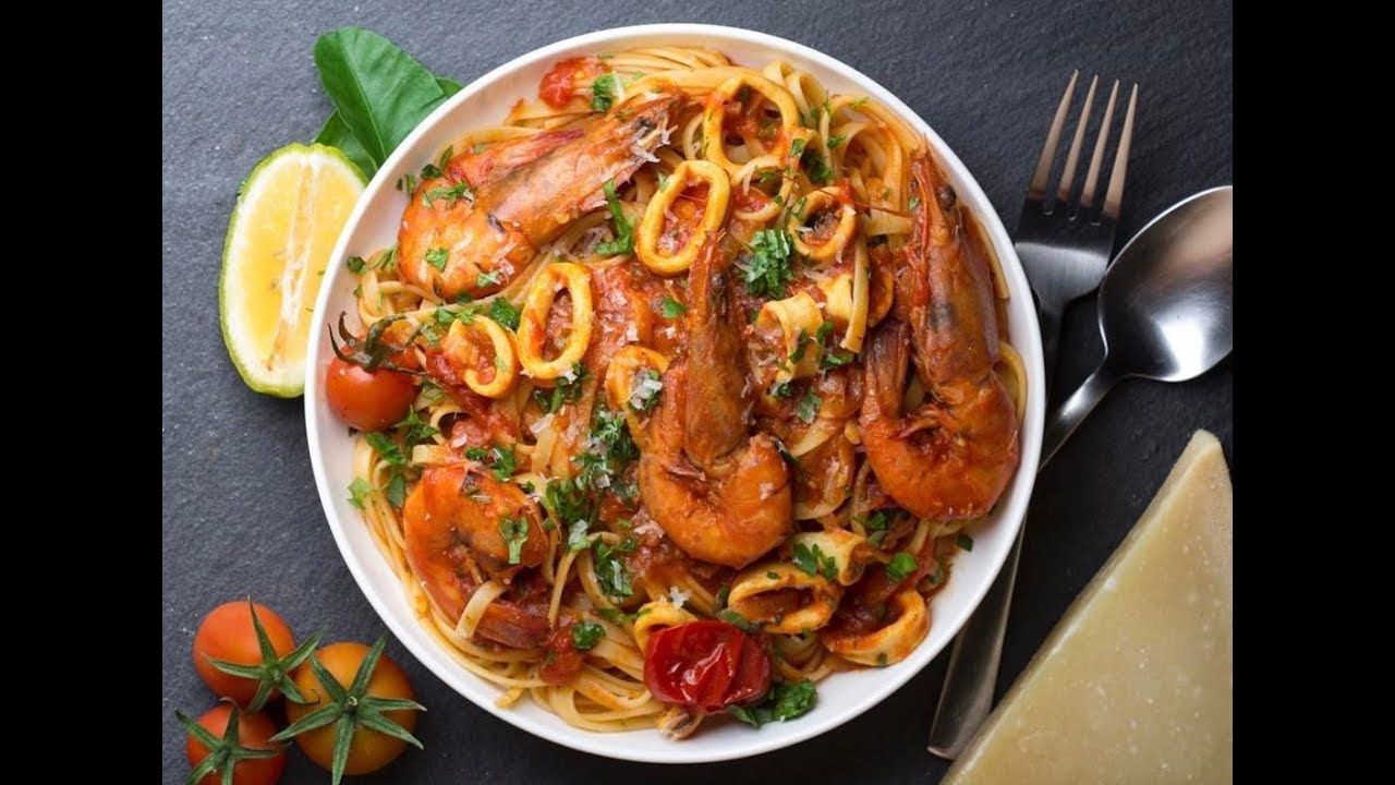 Mixed Seafood With Red Sauce And Basil Pasta