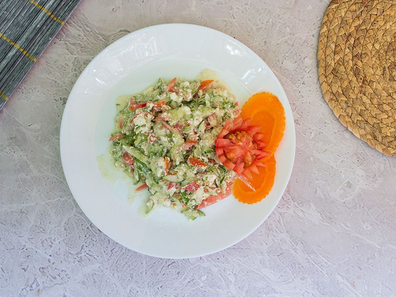 Feta cheese box with tomatoes