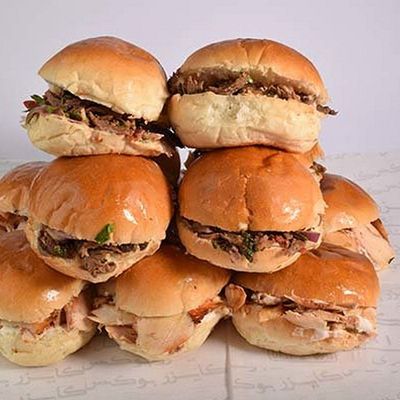 A box of a quarter dozen of chicken shawerma buns