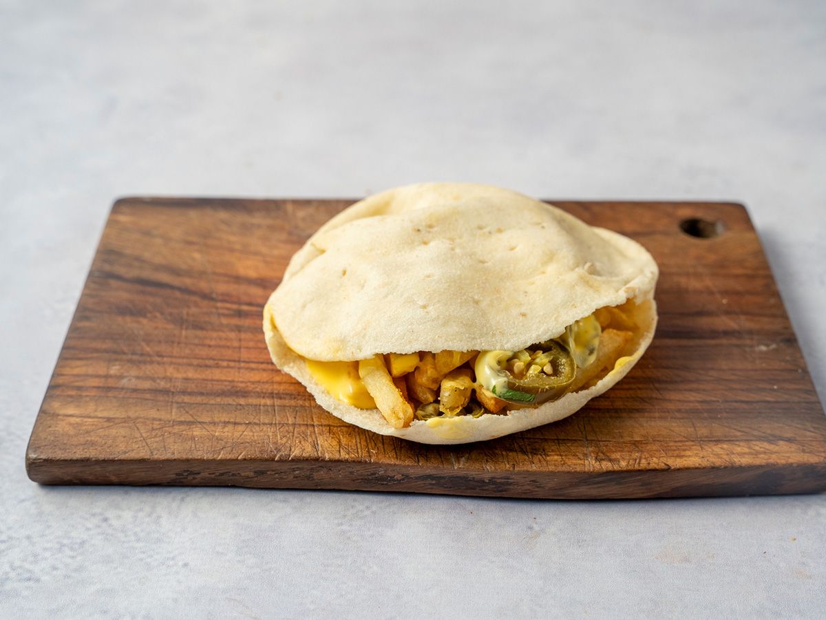 Potatoes Cheedar Sauce With Jalapeno Sandwich