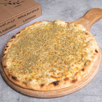 Akkawi kashkaval with a Sprinkle of Zaatar Manoucheh