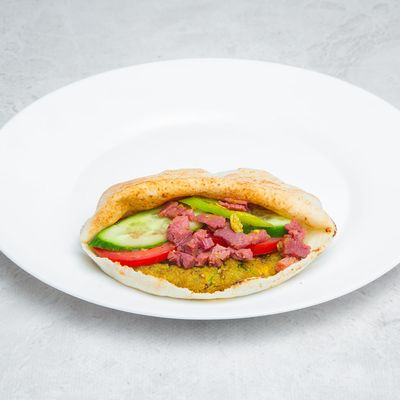 Falafel sandwich stuffed with pastrami